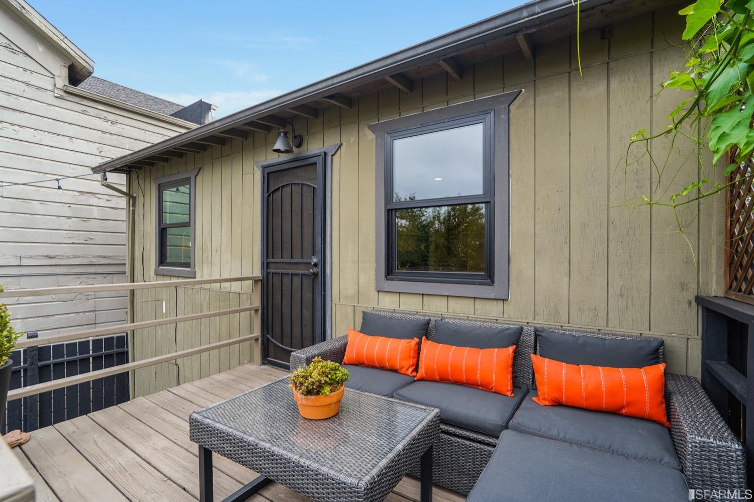 1015 26th Street Oakland, CA 94607 - Photo 25 of 33 a view of a dining table and chairs in the balcony