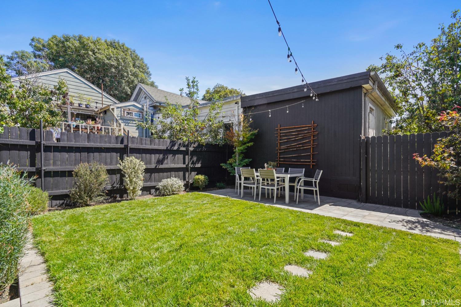 1015 26th Street Oakland, CA 94607 - Photo 27 of 33 a view of a house with a yard porch and sitting area