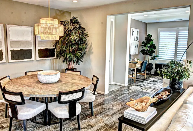 a view of a dining room with furniture window and outside view