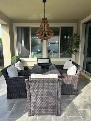 a dining room with furniture window and tables