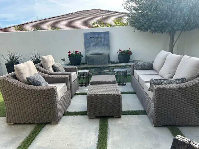 a living room with furniture and a couch