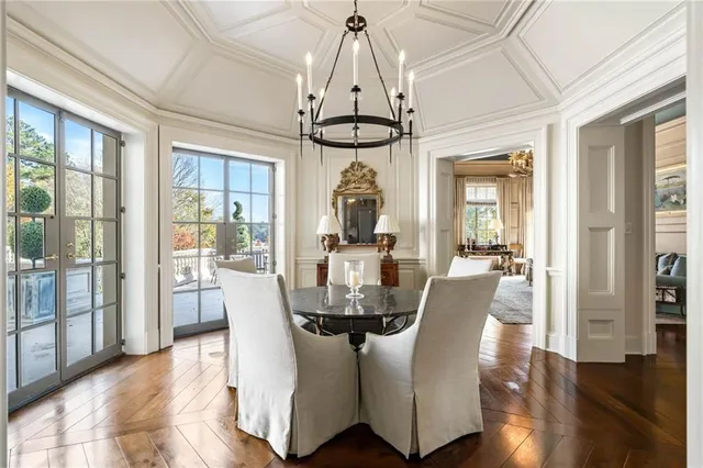 a living room with furniture fireplace and flat screen tv