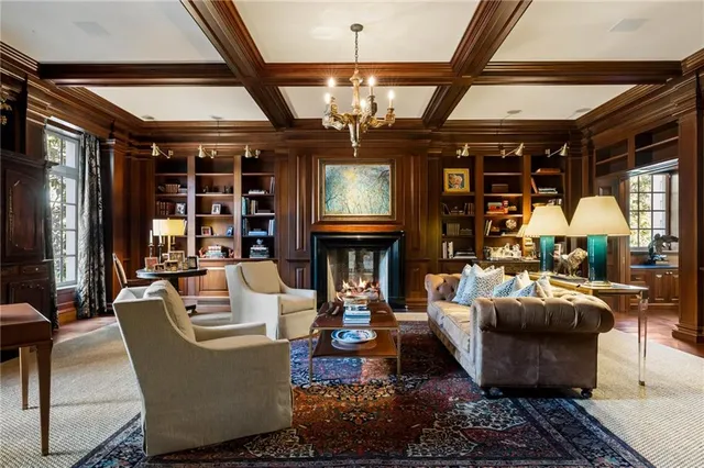 a bedroom with a bed and a fireplace