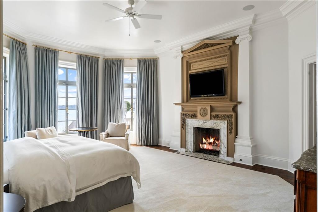 1405 Big Eddy Court Columbus, GA 31904 - Photo 22 of 53 a bedroom with a bed and a fireplace