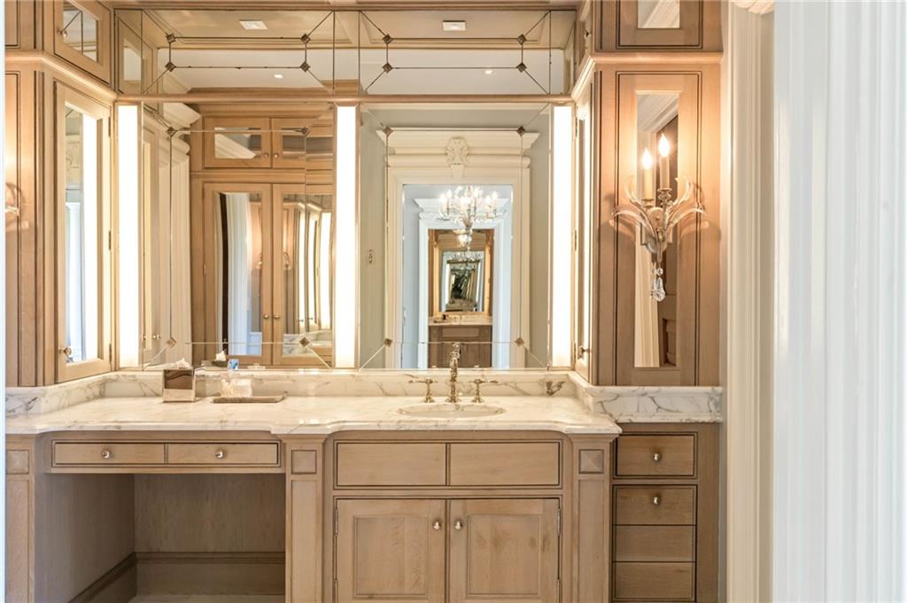 1405 Big Eddy Court Columbus, GA 31904 - Photo 25 of 53 a bathroom with a sink and a mirror