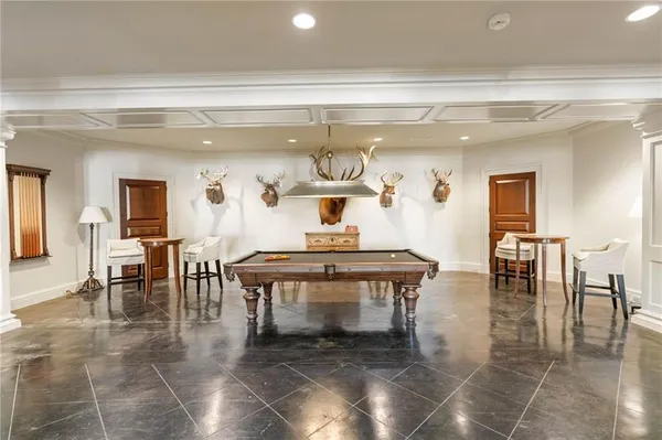 a view of a dinning table and chairs in the patio