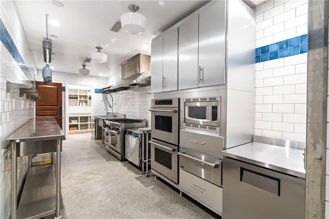 a view of a living room and a balcony