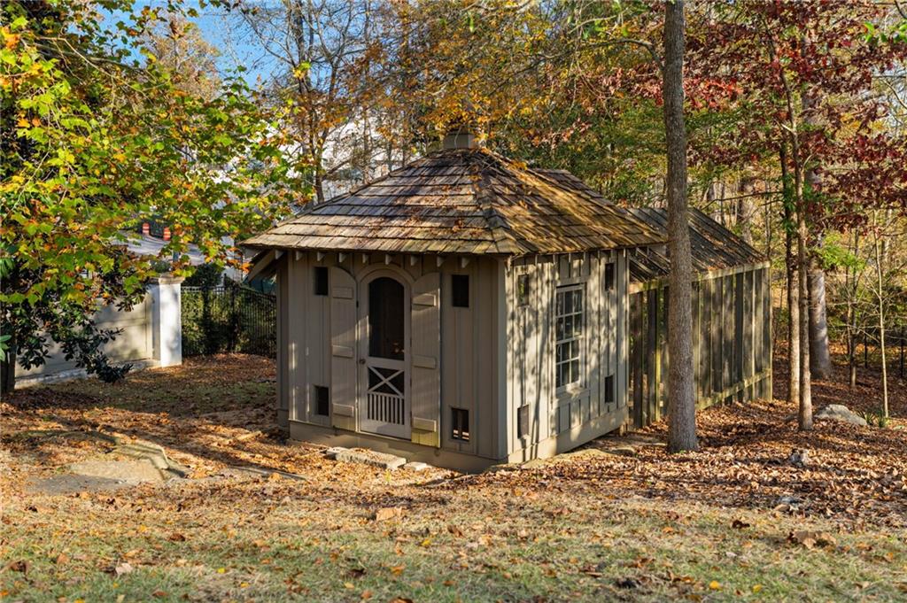1405 Big Eddy Court Columbus, GA 31904 - Photo 52 of 53 a view of a barn in the middle of a yard