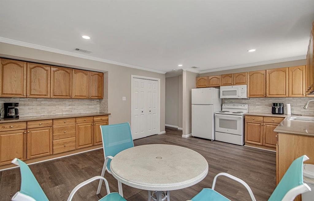 3952 J J Rendon Road Burleson, TX 76028 - Photo 10 of 25 2025 all the appliances were replaced, adding a new fresh look to this beautifully remodeled kitchen.