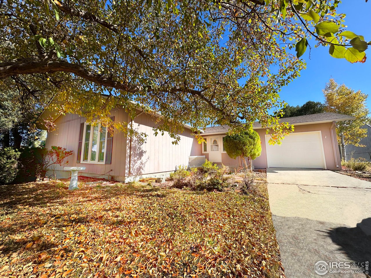 680 Clinic Drive Limon, CO 80828 - Photo 1 of 24 a front view of a house with a yard