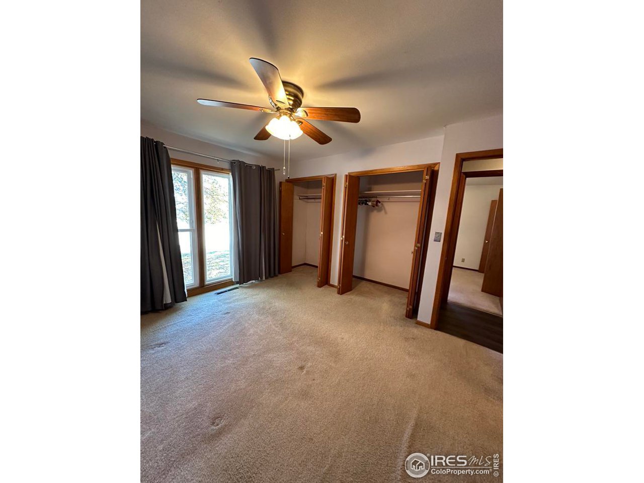 680 Clinic Drive Limon, CO 80828 - Photo 12 of 24 a view of a livingroom with a ceiling fan and window