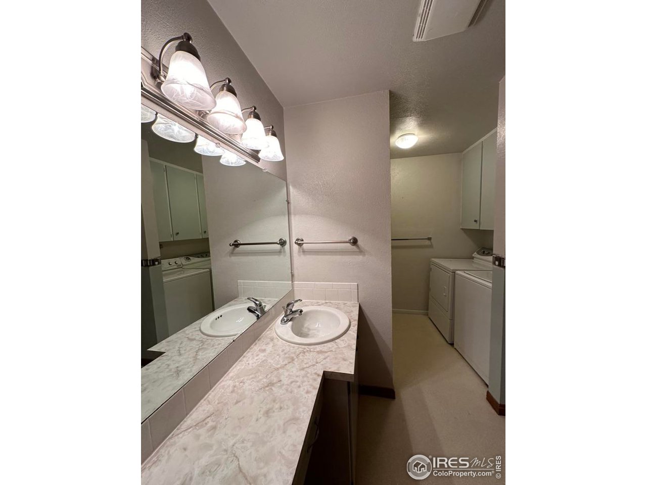 680 Clinic Drive Limon, CO 80828 - Photo 16 of 24 a bathroom with a toilet and a sink