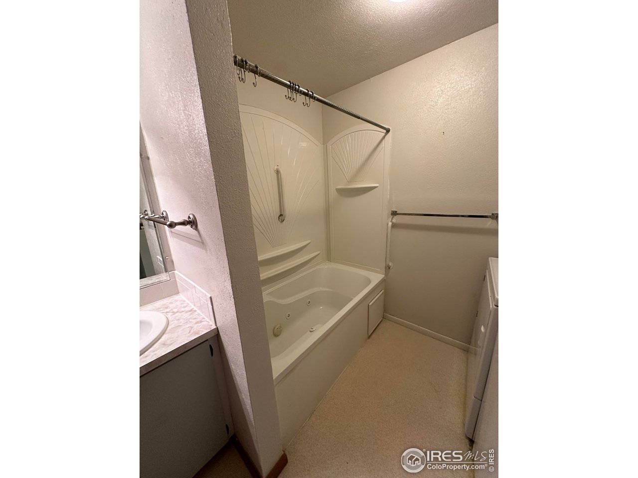 680 Clinic Drive Limon, CO 80828 - Photo 17 of 24 a bathroom with a tub shower and sink