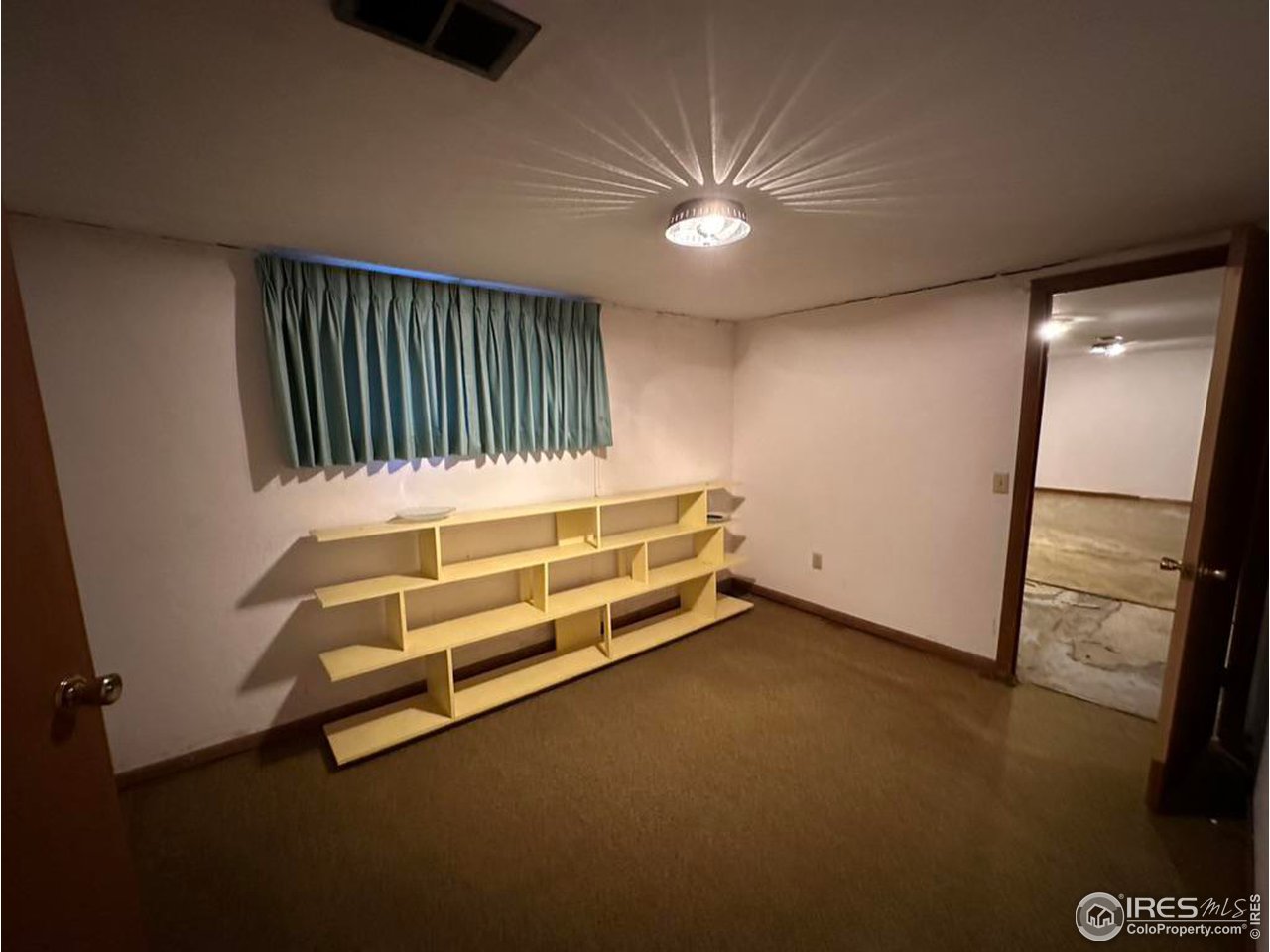 680 Clinic Drive Limon, CO 80828 - Photo 20 of 24 an empty room with windows