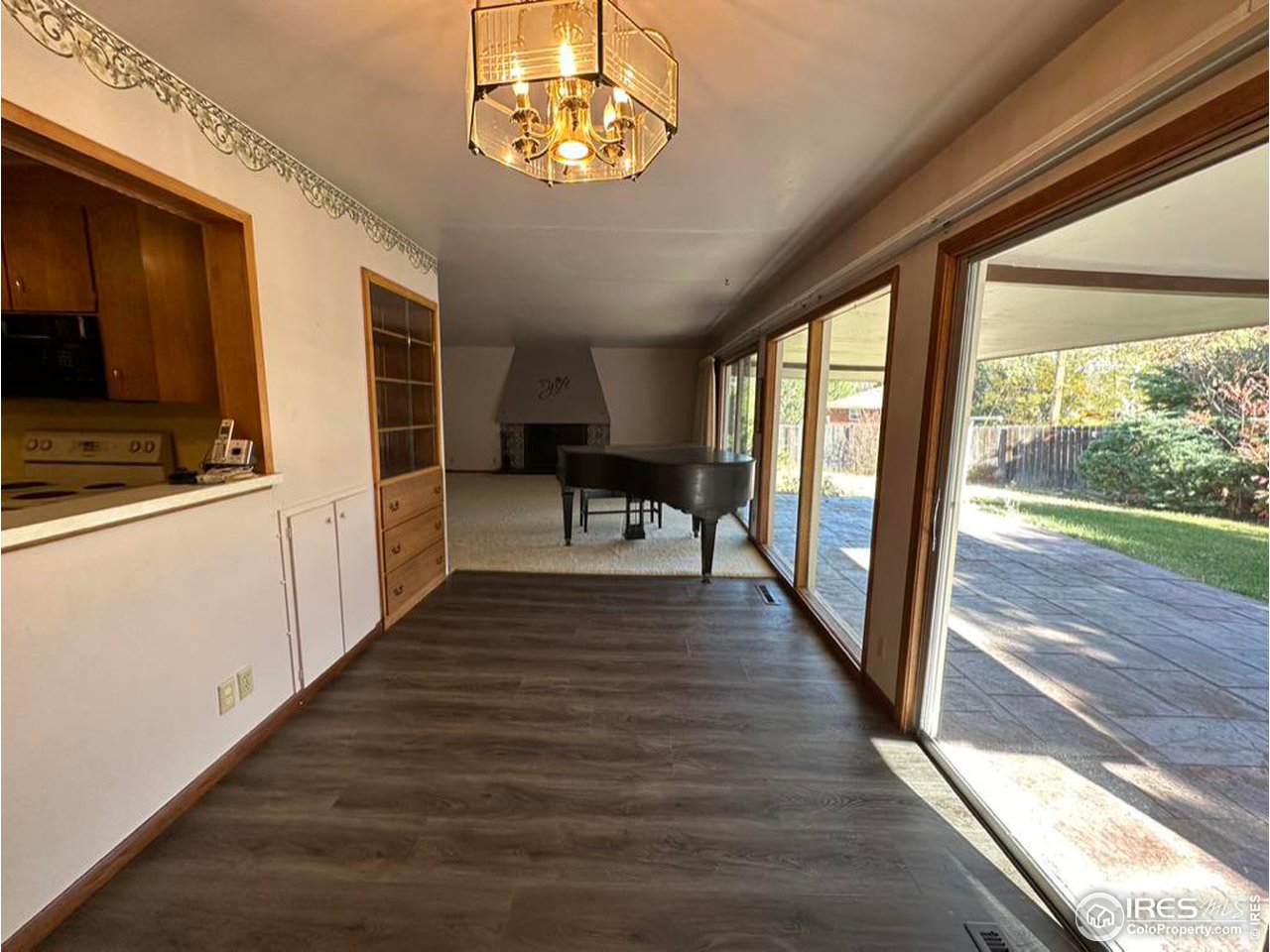 680 Clinic Drive Limon, CO 80828 - Photo 5 of 24 a view of a hallway with wooden floor and windows