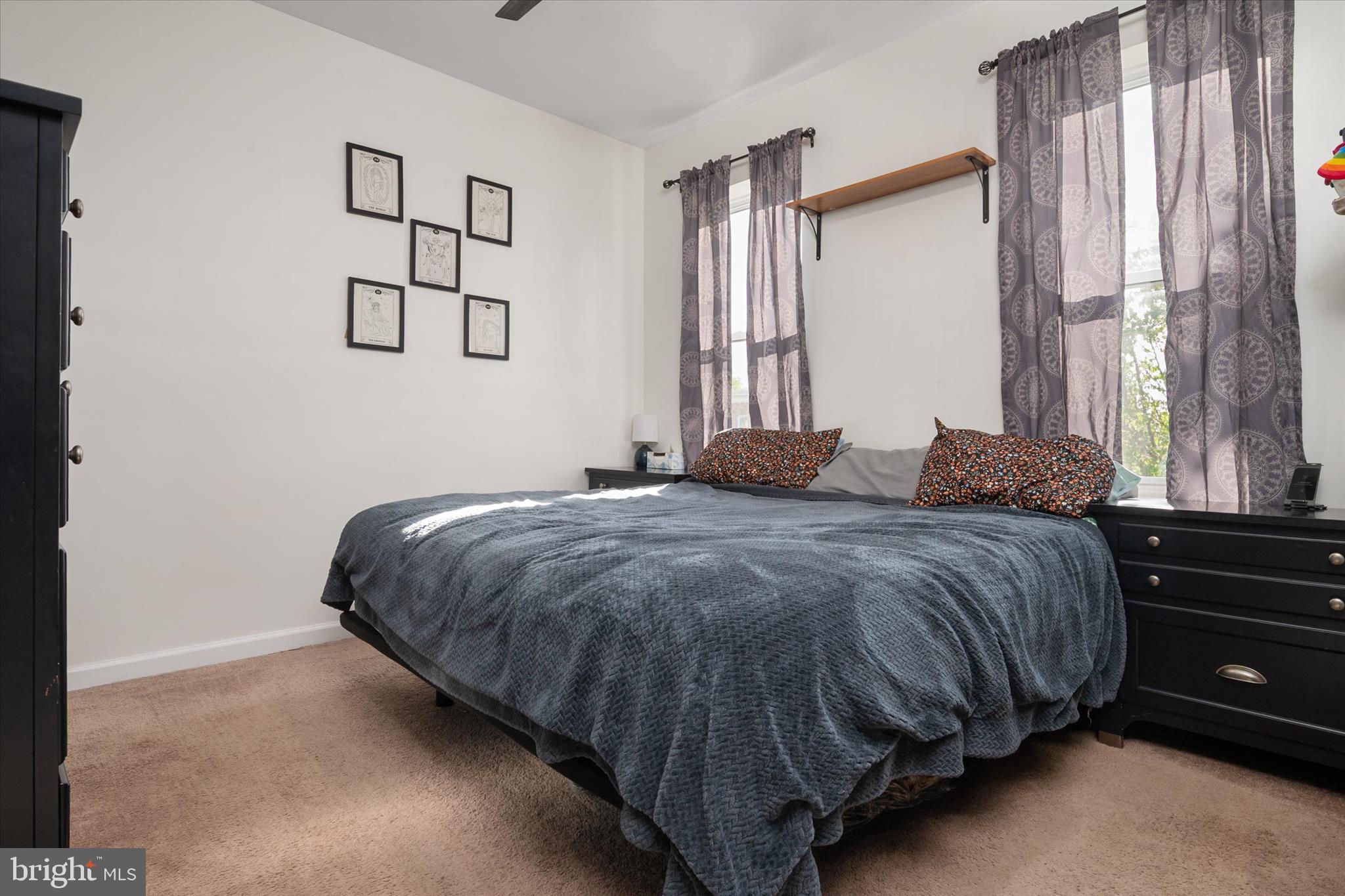 3714 5th Street Baltimore, MD 21225 - Photo 15 of 35 a bedroom with a bed and a window