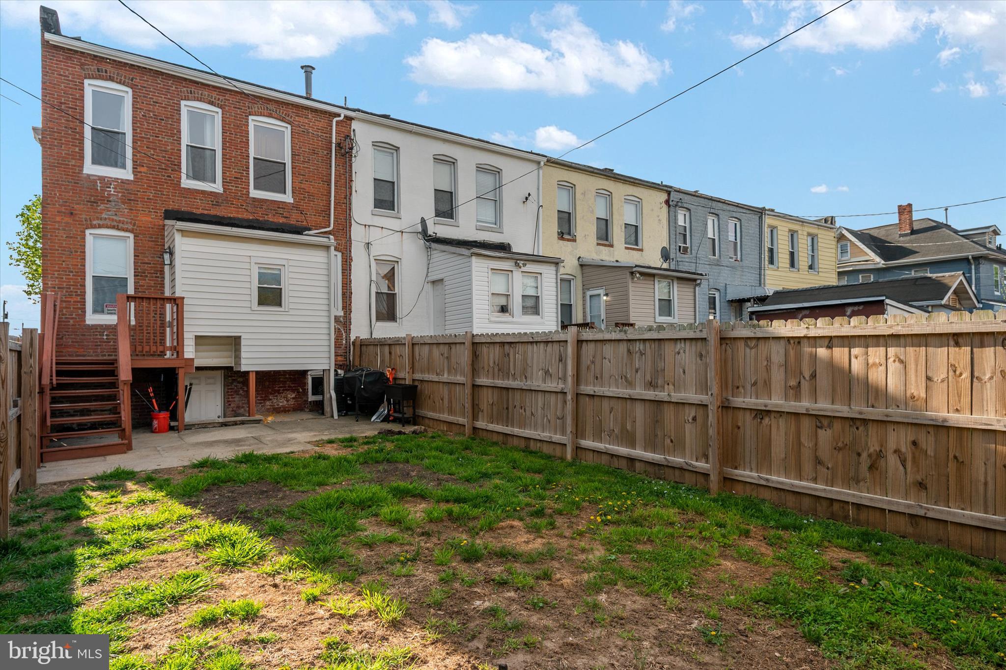 3714 5th Street Baltimore, MD 21225 - Photo 28 of 35 a view of a front of a house with a yard