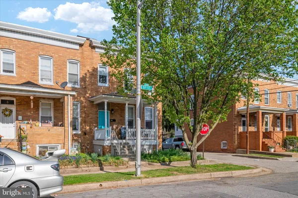 a front view of a building with garden