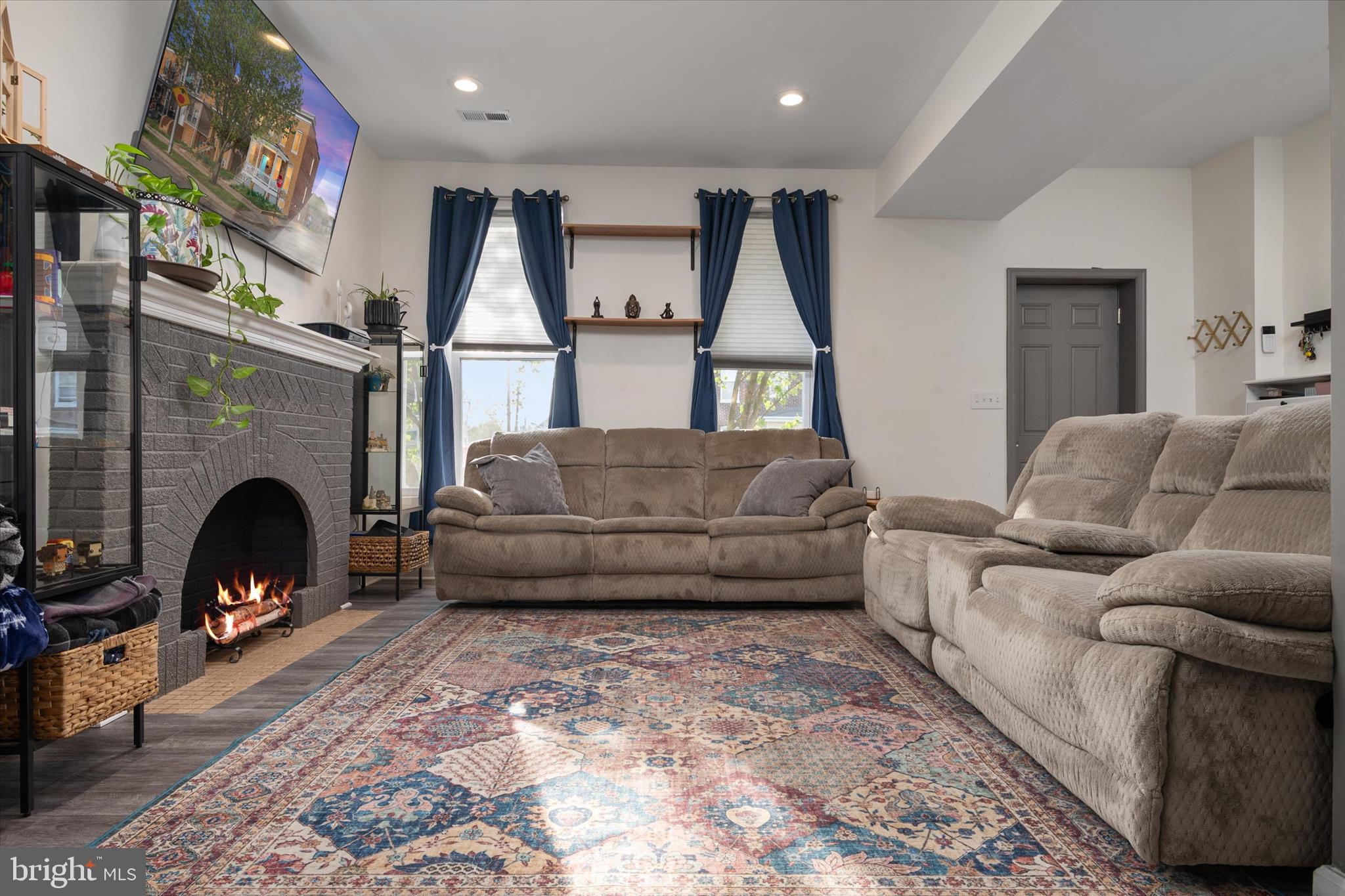 3714 5th Street Baltimore, MD 21225 - Photo 7 of 35 a living room with furniture and a fireplace