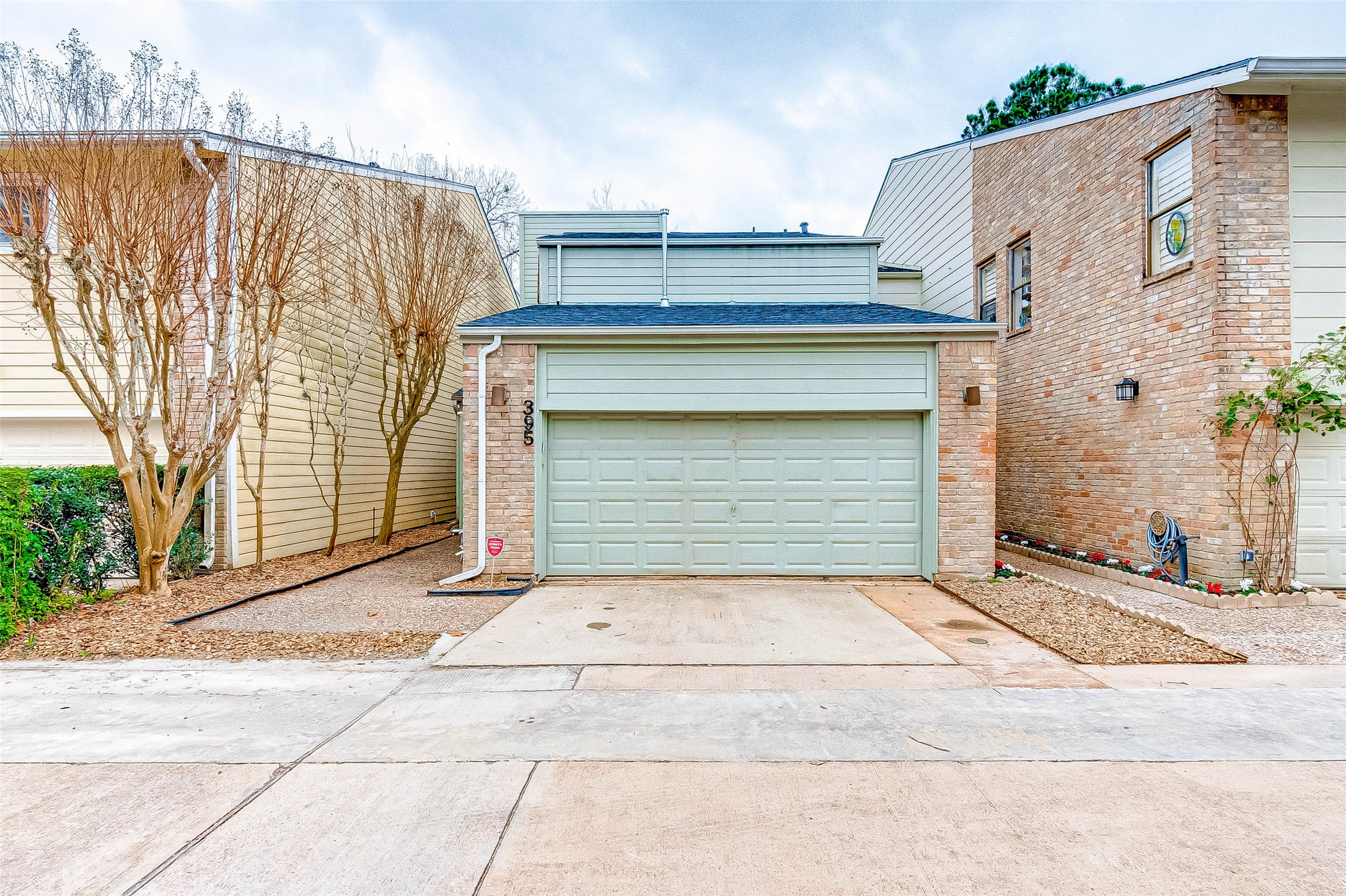 a view of a house with a garage