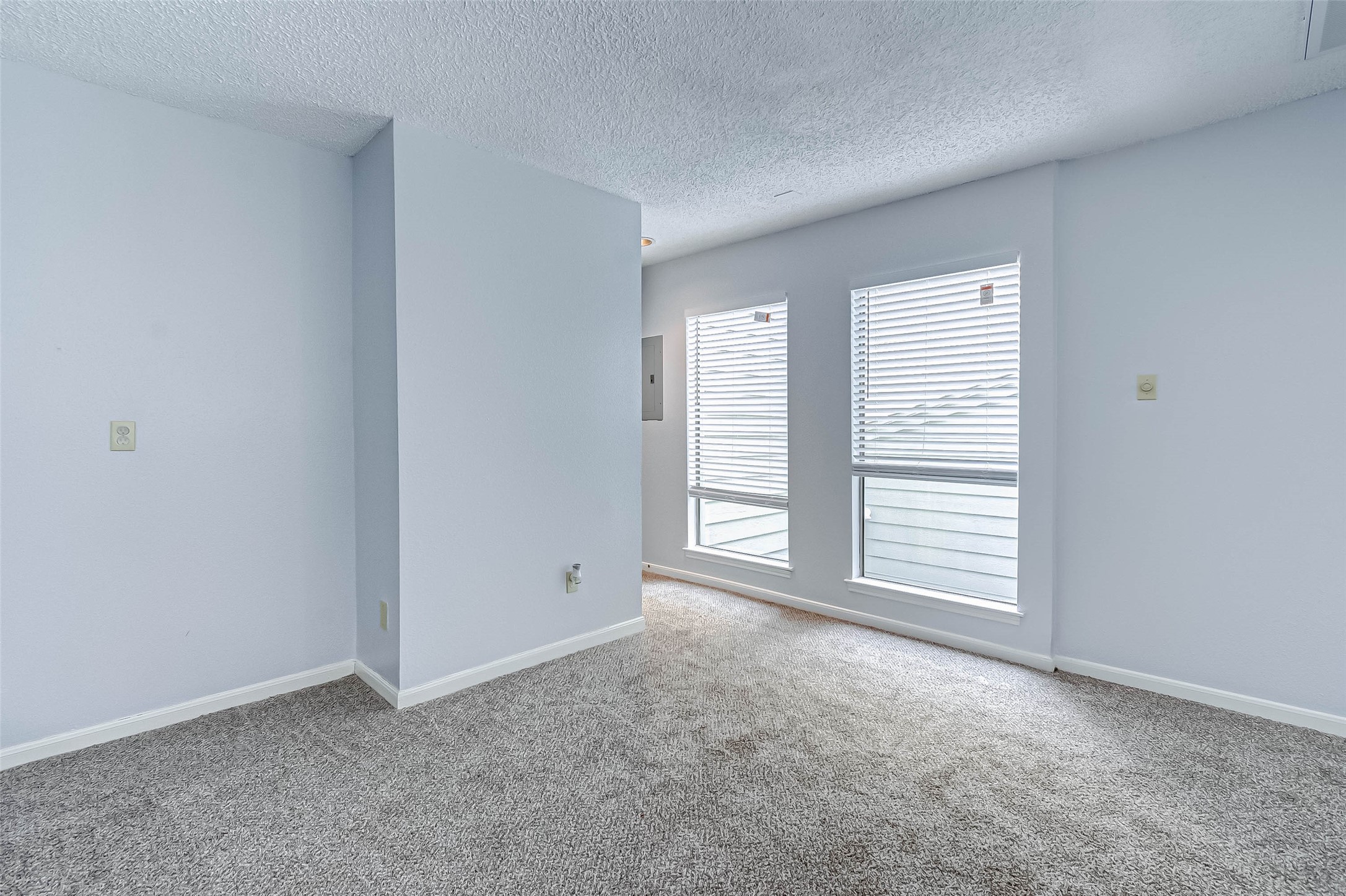 395 Rancho Bauer Drive Houston, TX 77079 - Photo 34 of 50 an empty room with windows