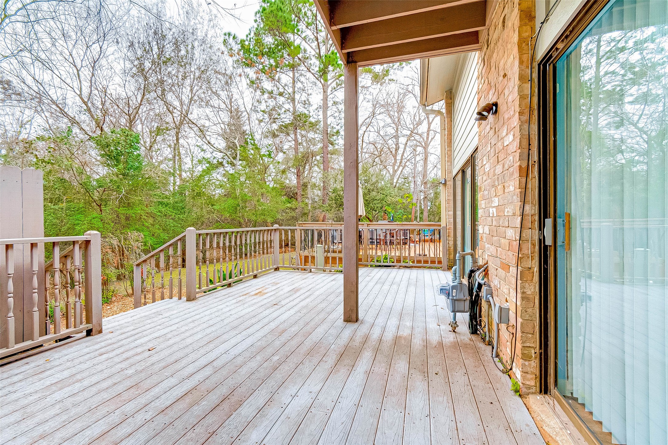 395 Rancho Bauer Drive Houston, TX 77079 - Photo 46 of 50 a view of balcony with wooden floor