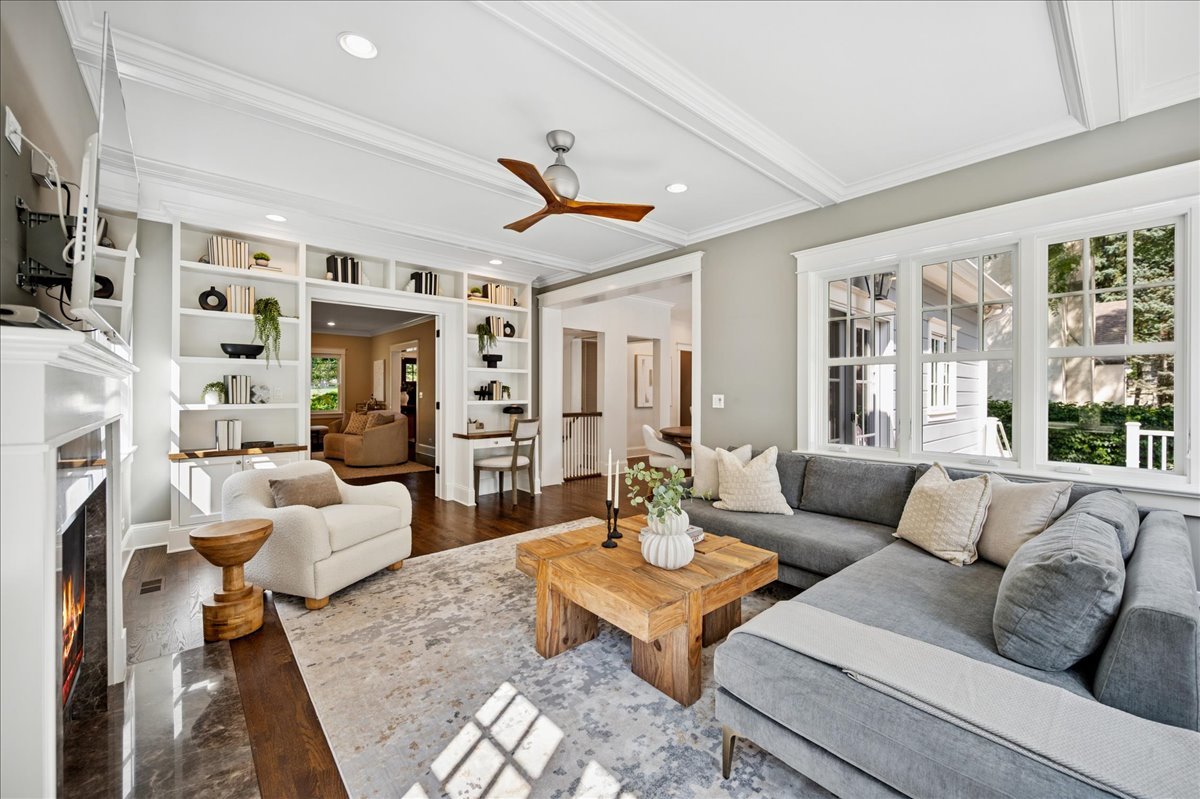 519 Cedar Street Winnetka, IL 60093 - Photo 16 of 36 a living room with furniture kitchen view and a large window