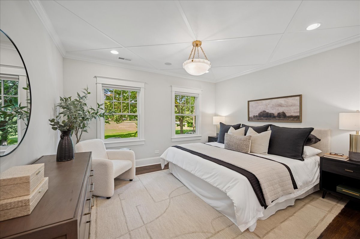 519 Cedar Street Winnetka, IL 60093 - Photo 18 of 36 a bedroom with bed and a large window