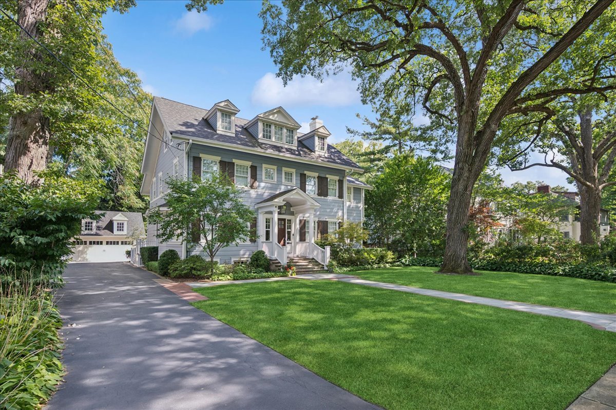 519 Cedar Street Winnetka, IL 60093 - Photo 2 of 36 a front view of house with yard and green space