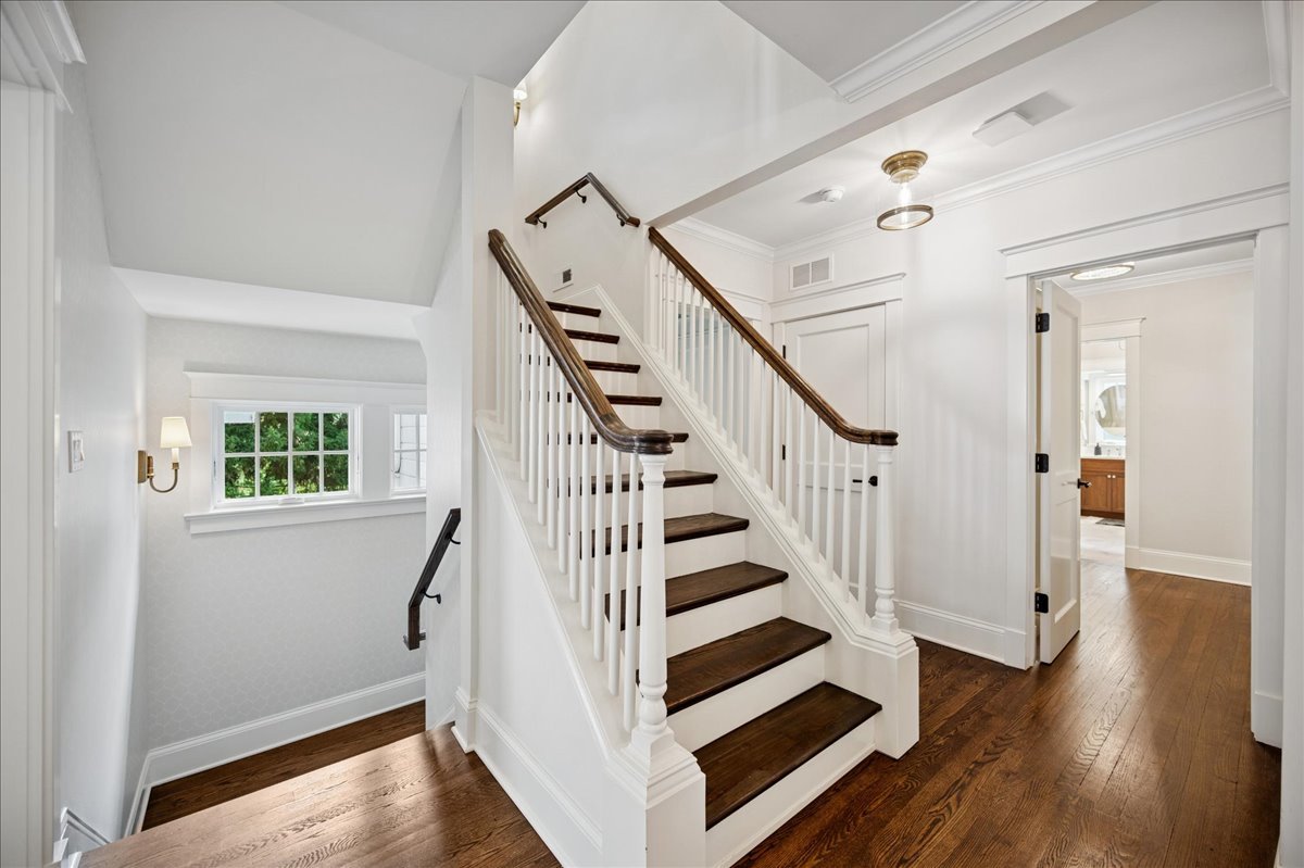 519 Cedar Street Winnetka, IL 60093 - Photo 23 of 36 a view of entryway with wooden floor and stairs