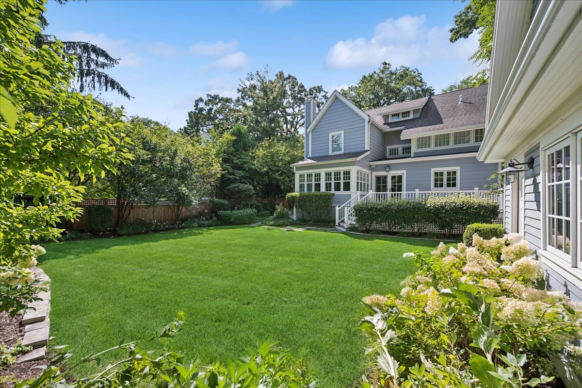 519 Cedar Street Winnetka, IL 60093 - Photo 32 of 36 a front view of a house with a yard