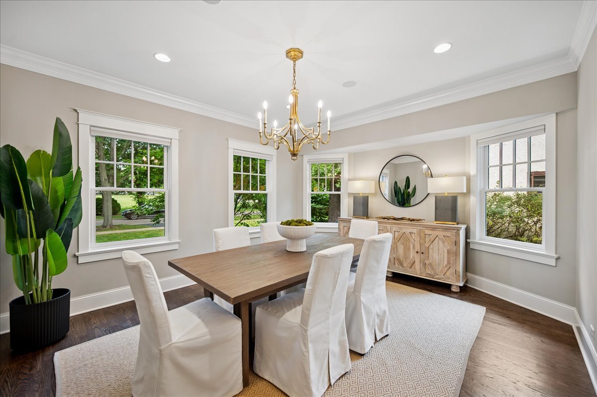 519 Cedar Street Winnetka, IL 60093 - Photo 8 of 36 a view of a dining room with furniture window and wooden floor