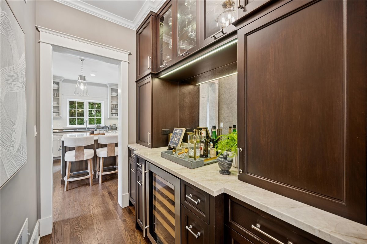 519 Cedar Street Winnetka, IL 60093 - Photo 9 of 36 a bathroom with a sink and a mirror