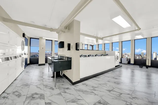 a large white room with a large window