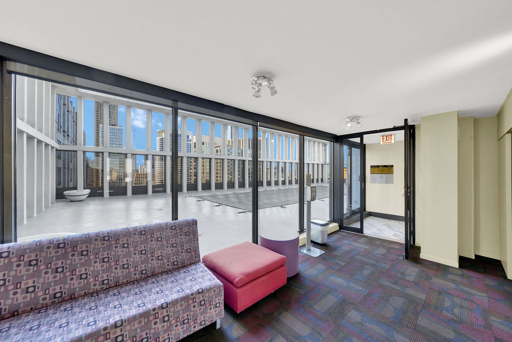 100 East Walton Street, Unit 17C Chicago, IL 60611 - Photo 19 of 21 a living room with furniture