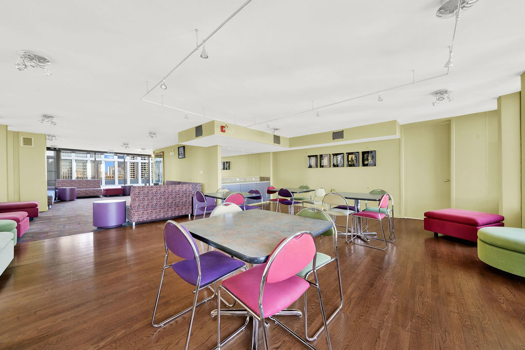 100 East Walton Street, Unit 17C Chicago, IL 60611 - Photo 20 of 21 a living room with furniture and wooden floor