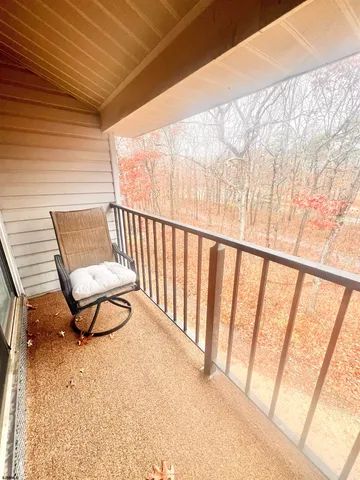 a view of a two chairs in the room