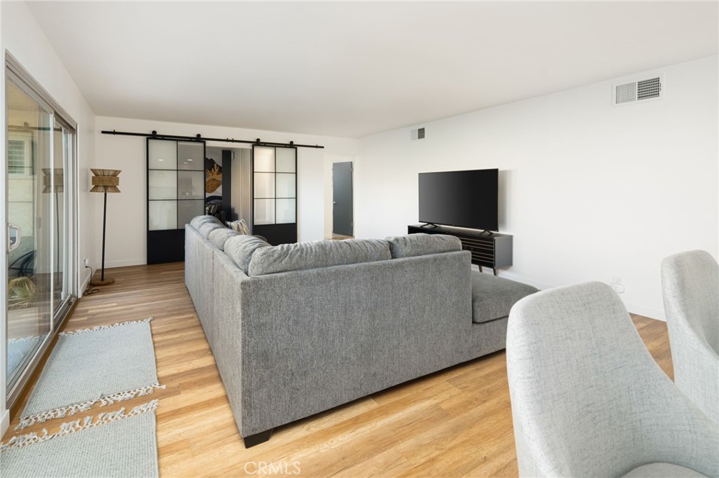 80071 Palm Cir Drive La Quinta, CA 92253 - Photo 13 of 40 a living room with furniture and a flat screen tv