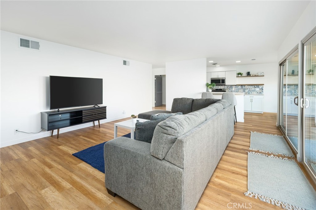 80071 Palm Cir Drive La Quinta, CA 92253 - Photo 14 of 40 a living room with furniture and a flat screen tv