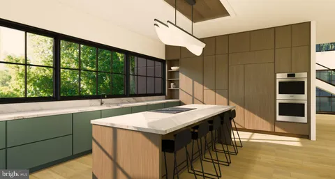 a kitchen that has a cabinets and a stove top oven