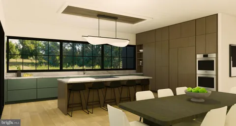 a kitchen with a table chairs and a table