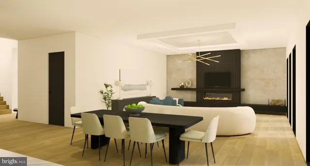 a view of a dining room with furniture and a rug
