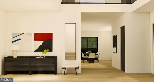 a view of living room with furniture and lamp