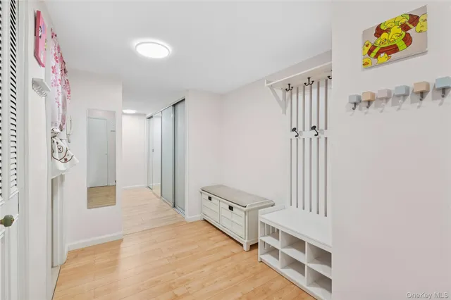 a kitchen with stainless steel appliances a stove a sink and a refrigerator