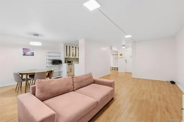 a bathroom with a sink a mirror and a shower