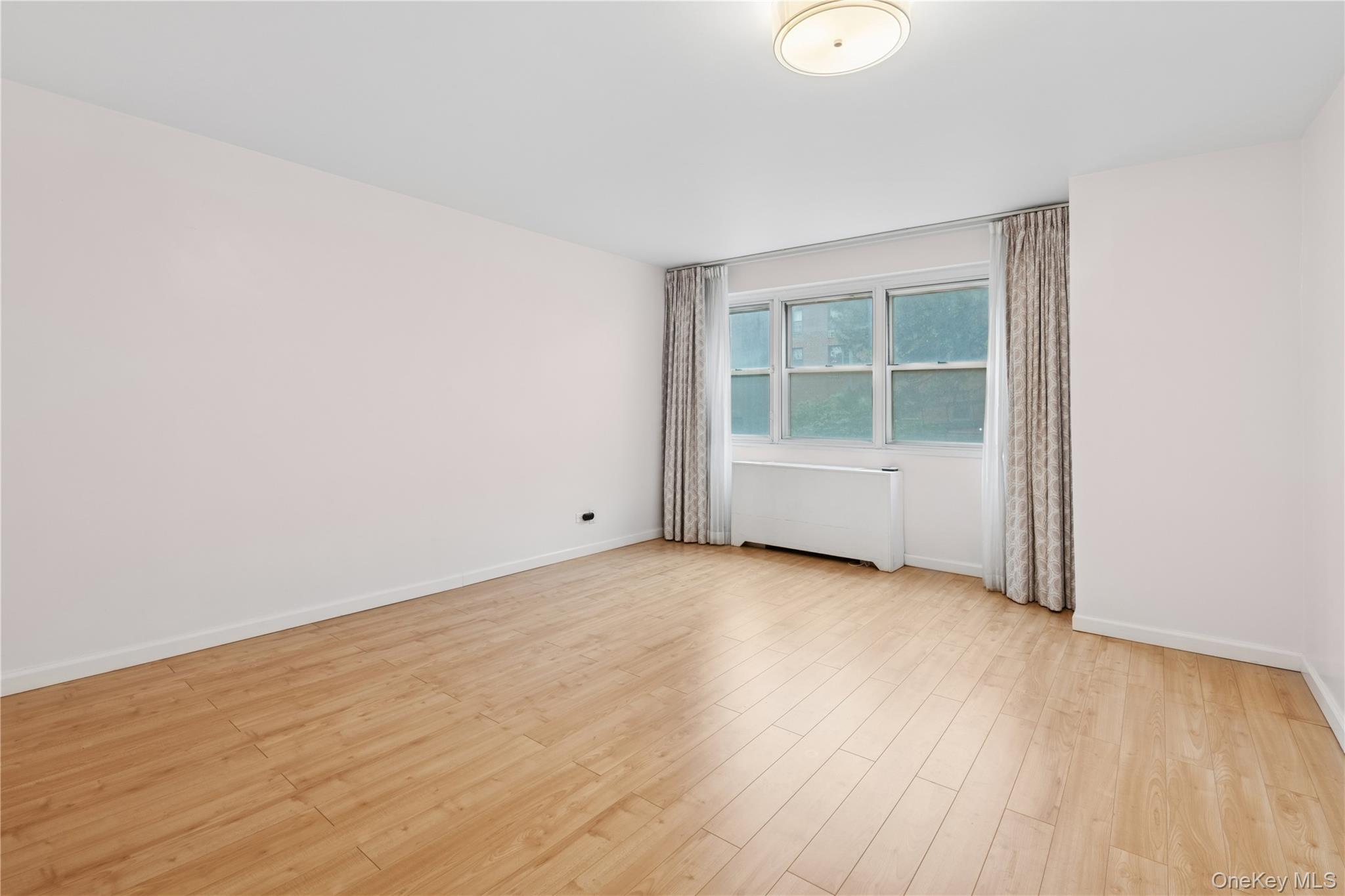 102-30 66th Road, Unit 1G Queens, NY 11375 - Photo 8 of 10 King sized Primary Bedroom