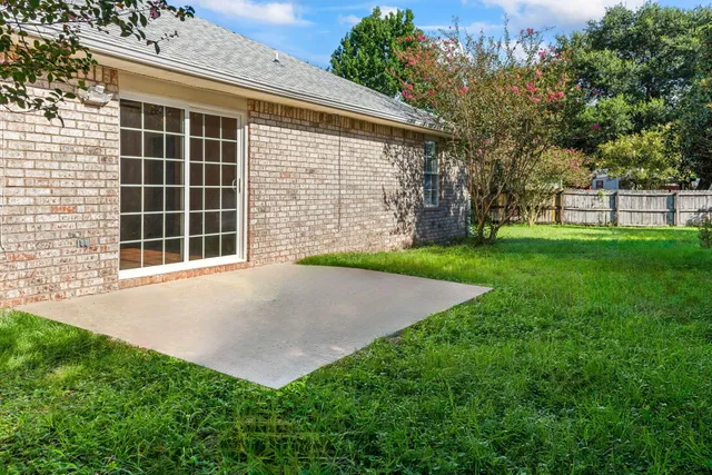 a view of a backyard with a garden