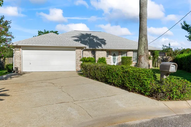 a view of a house with a garden