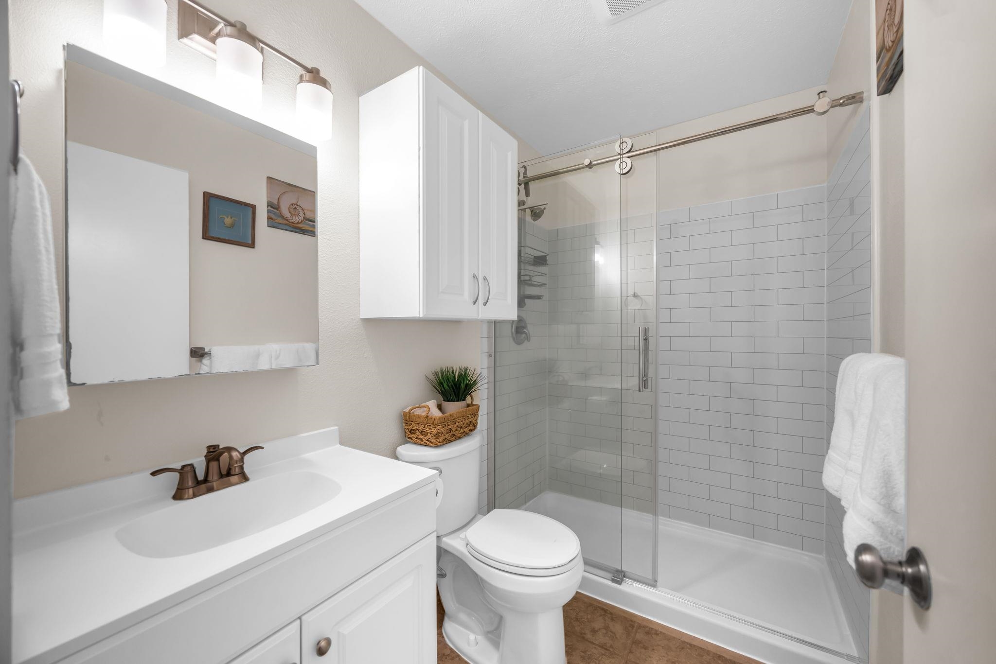 483 South Kihei Road, Unit 215 Kihei, HI 96753 - Photo 35 of 49 a bathroom with a sink toilet and shower