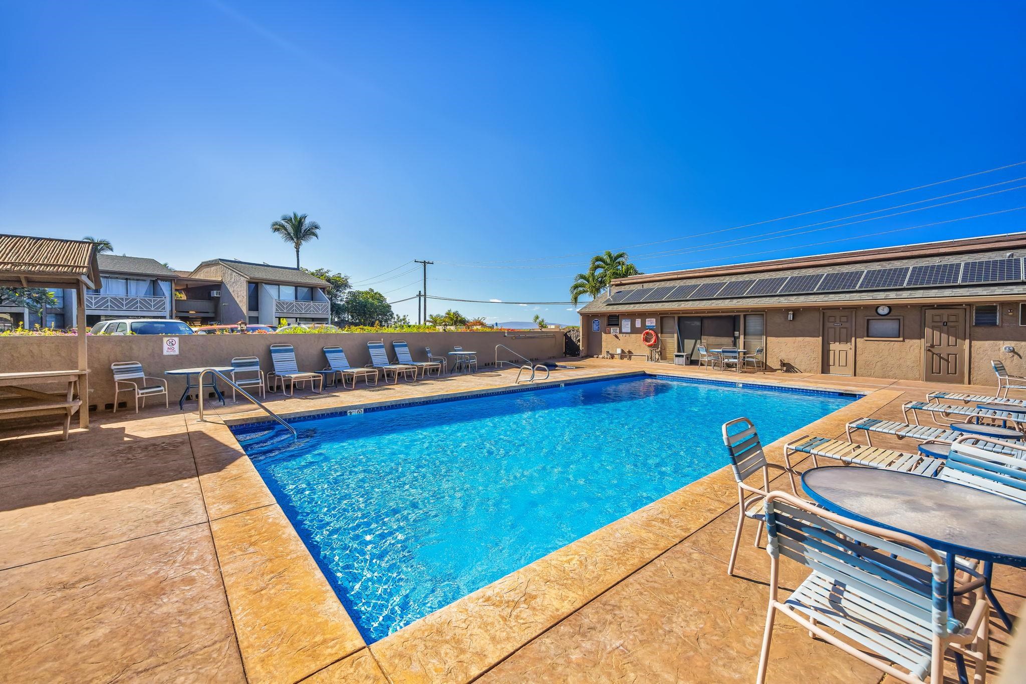 483 South Kihei Road, Unit 215 Kihei, HI 96753 - Photo 42 of 49 a view of a swimming pool with seating area